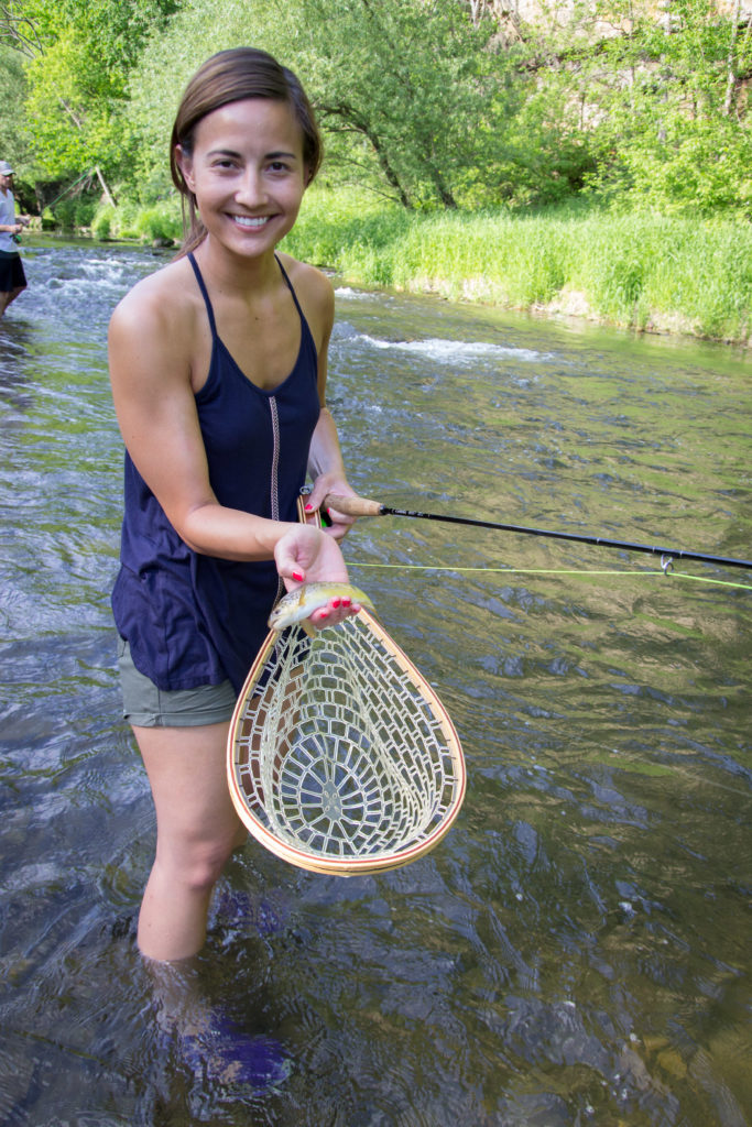 Angy's first fish on a fly.